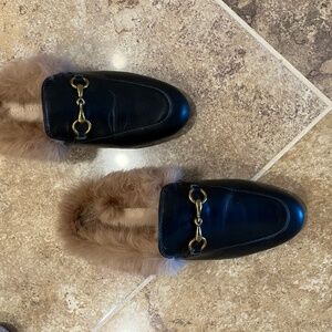Black leather horsebit fur mules